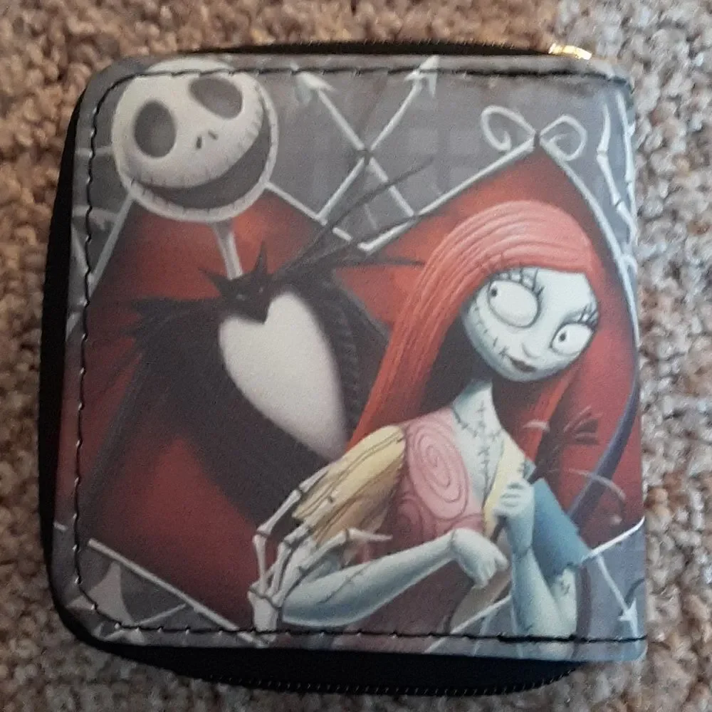NWOT  Nightmare Before Christmas short wallet with zippered closure.